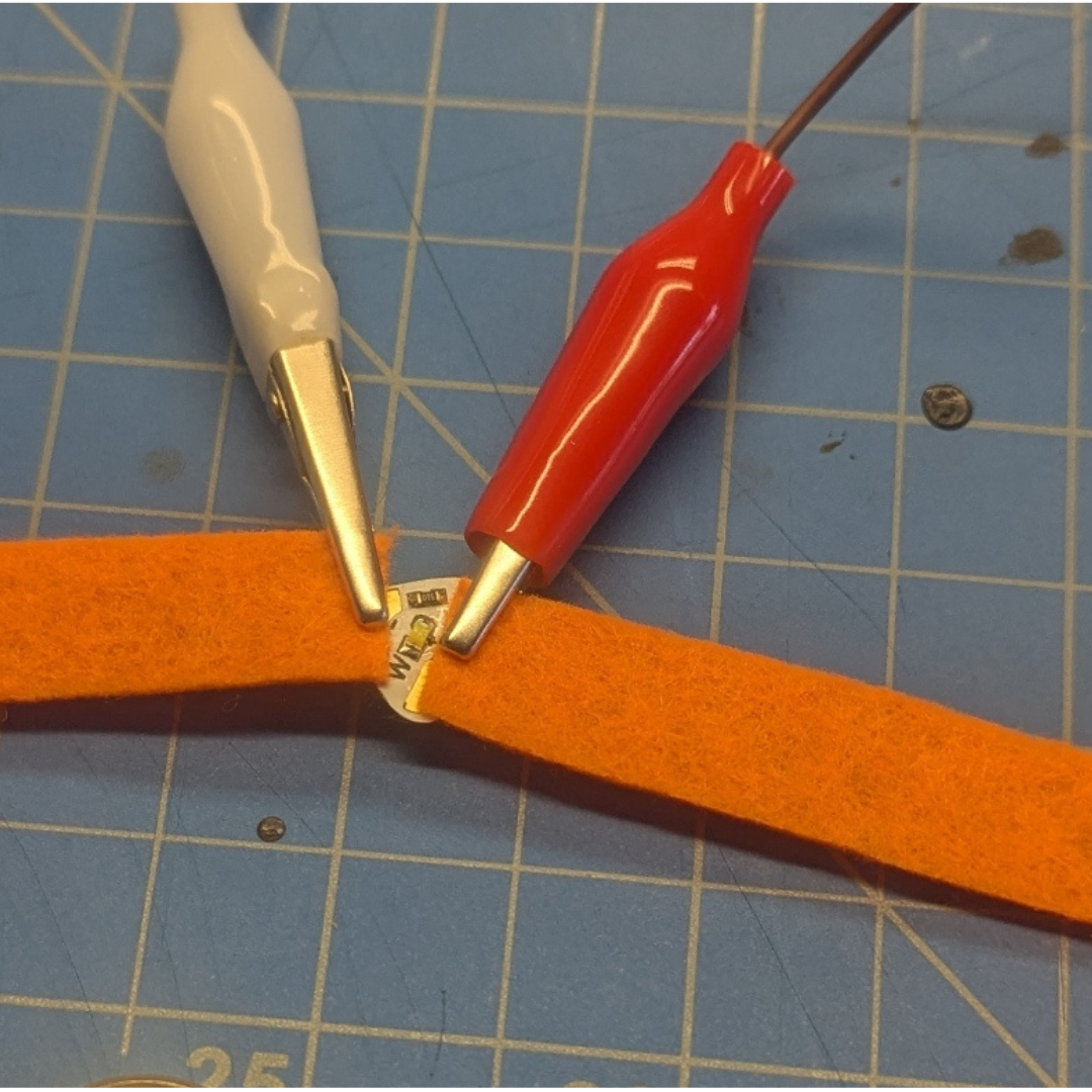 Then I did the same with the conductive fabric, and once again, the picky LED light refused to cooperate.